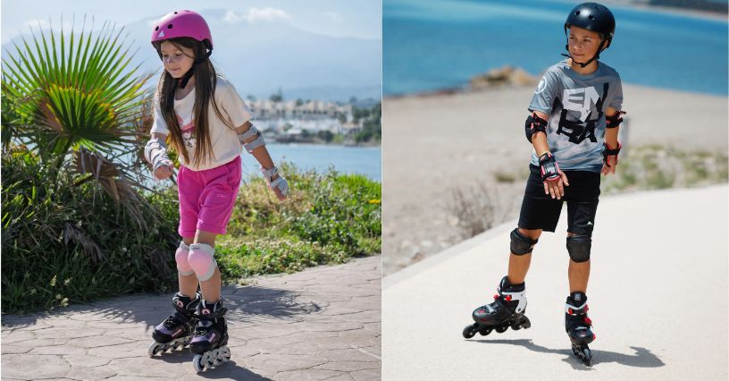 Dziewczynka i chłopiec w kaskach i ochraniaczach jeżdżą na rolkach po nadmorskich ścieżkach