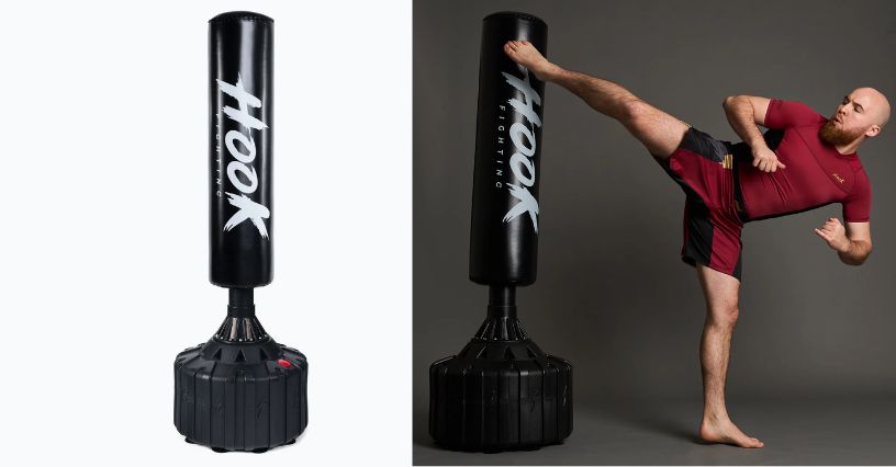 Mężczyzna ćwiczy kopnięcia na worku bokserskim stojącym HOOK FIGHTING HKF-SBB180 