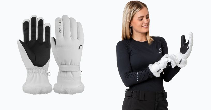 Kobieta w stroju narciarskim zakłada rękawice na narty Reusch Luna R-Tex XT 