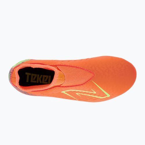 Buty piłkarskie dziecięce New Balance Tekela Magique V4+ FG neon dragonfly