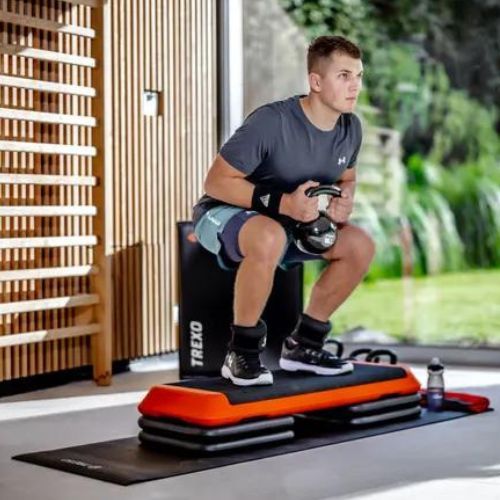 Step do aerobiku TREXO Aerobic max stability pomarańczowy