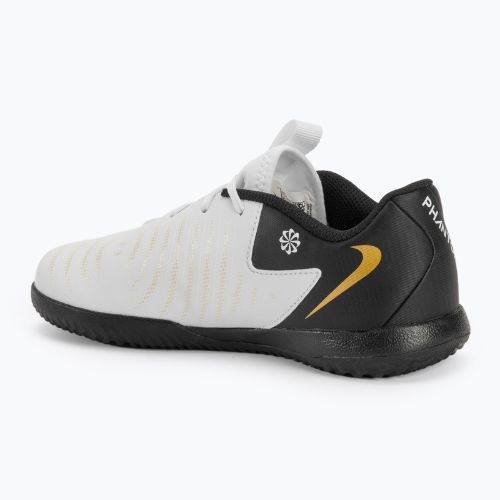 Buty piłkarskie dziecięce Nike Phantom GX II Academy IC white/metallic gold coin/black