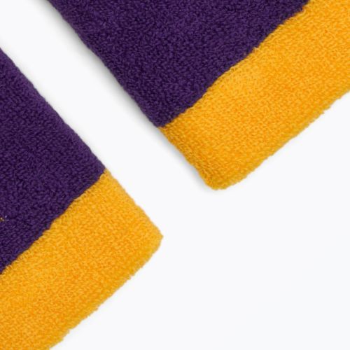 Frotki na nadgarstek Nike Swoosh Doublewide Wristbands 2 szt. university gold/court purple/university gold
