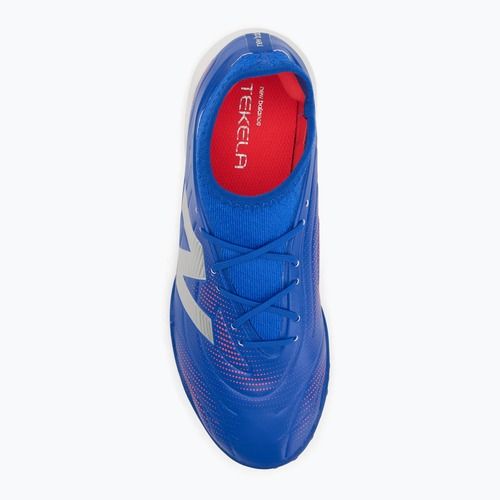 Buty do piłki nożnej dziecięce New Balance Tekela Team Low JR TF blue