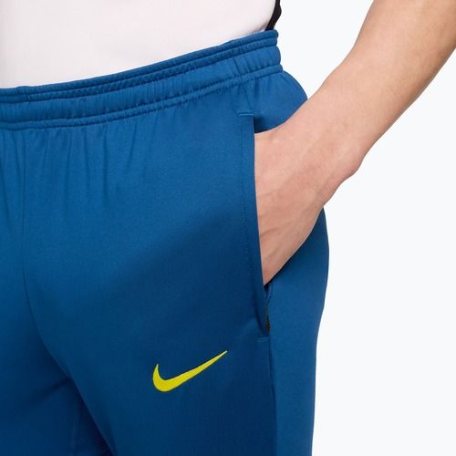 Spodnie piłkarskie męskie Nike FC Barcelona Strike SE gym blue/opti yellow