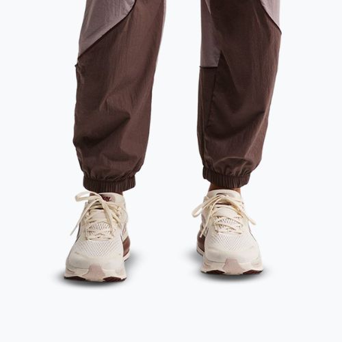 Spodnie do biegania damskie Nike Swift UV Repel Mid-Rise tattoo/light violet ore