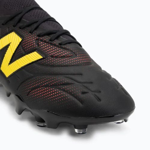 Buty piłkarskie New Balance Tekela Pro Low V5 FG black 100/punch yellow/fire cracker