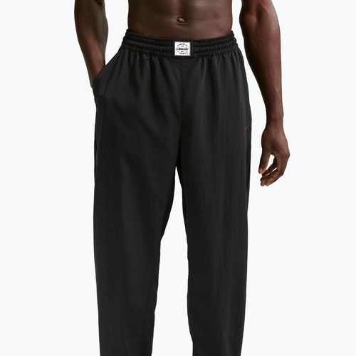 Spodnie męskie Nike N.A.C. Dri-Fit Woven black/pale ivory/black