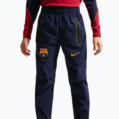 Spodnie piłkarskie dziecięce Nike FC Barcelona Tech Woven blackened blue/black/mineral yellow