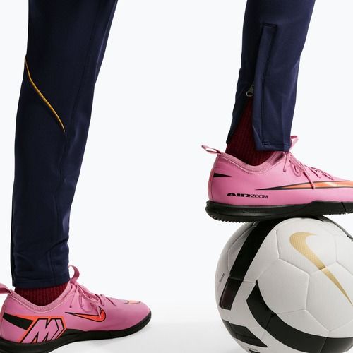 Spodnie piłkarskie dziecięce Nike FC Barcelona Strike Dri-Fit blackened blue/noble red/yellow