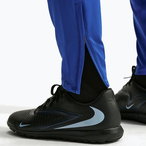 Spodnie piłkarskie męskie Nike FFF Strike game royal/metallic copper