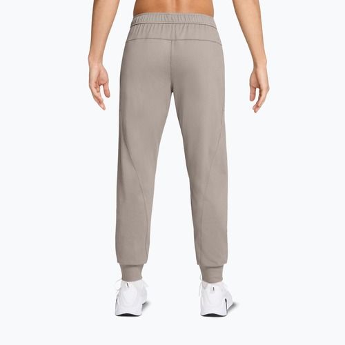 Spodnie męskie Nike Primary NanoKnit UV Performance moon particle/college grey/moon particle