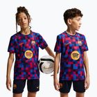 Koszulka piłkarska dziecięca Nike FC Barcelona Dri-Fit Pre-Match noble red/mineral yellow