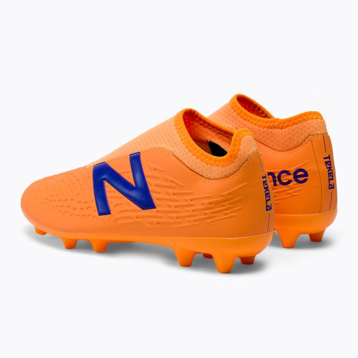 Buty piłkarskie dziecięce New Balance Tekela V3+ Magique JNR FG impulse/vibrant orange 3