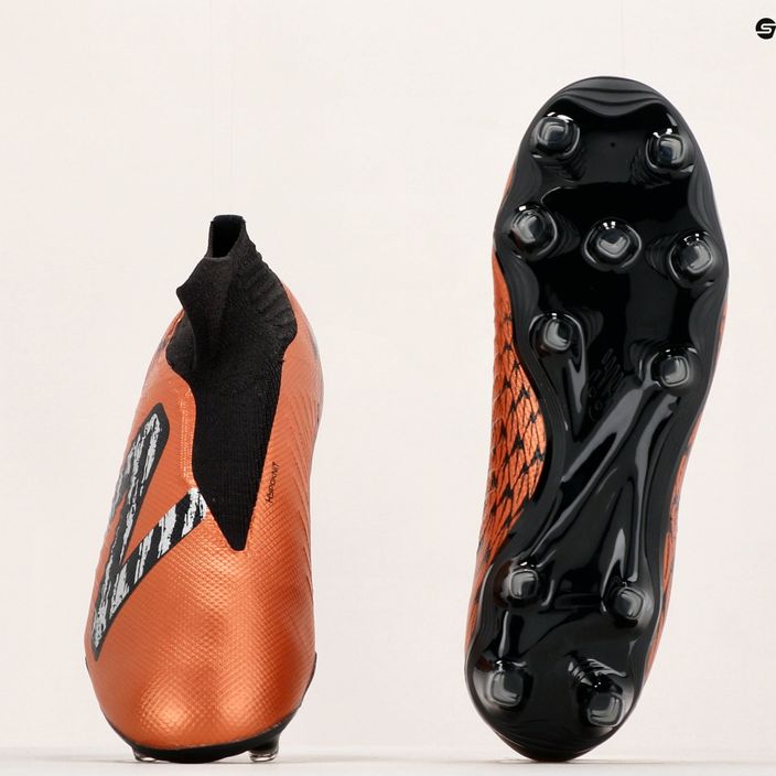 Buty piłkarskie męskie New Balance Tekela V4 Magia FG copper 12