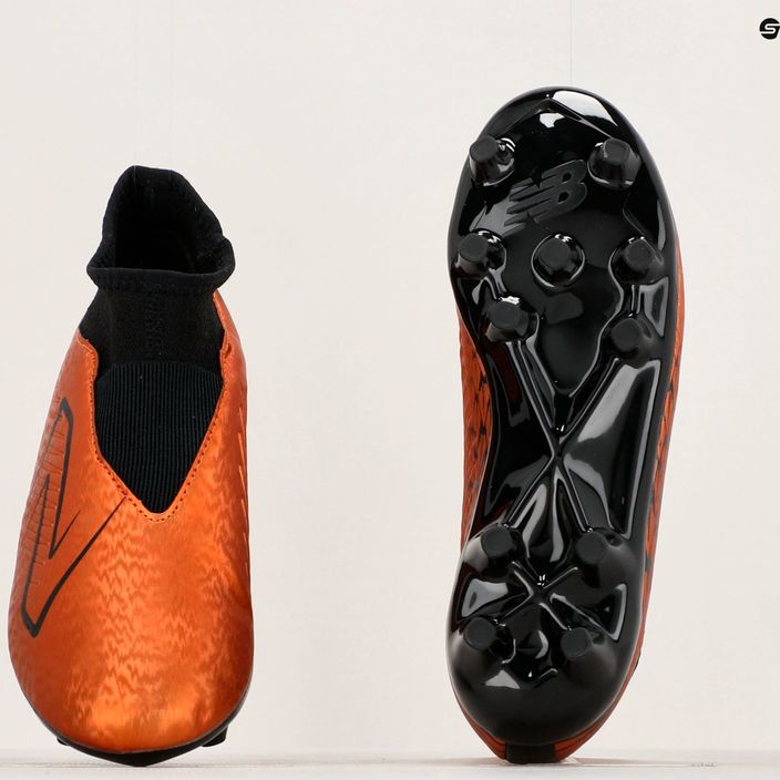 Buty piłkarskie dziecięce New Balance Tekela V4 Magique JNR FG copper 12