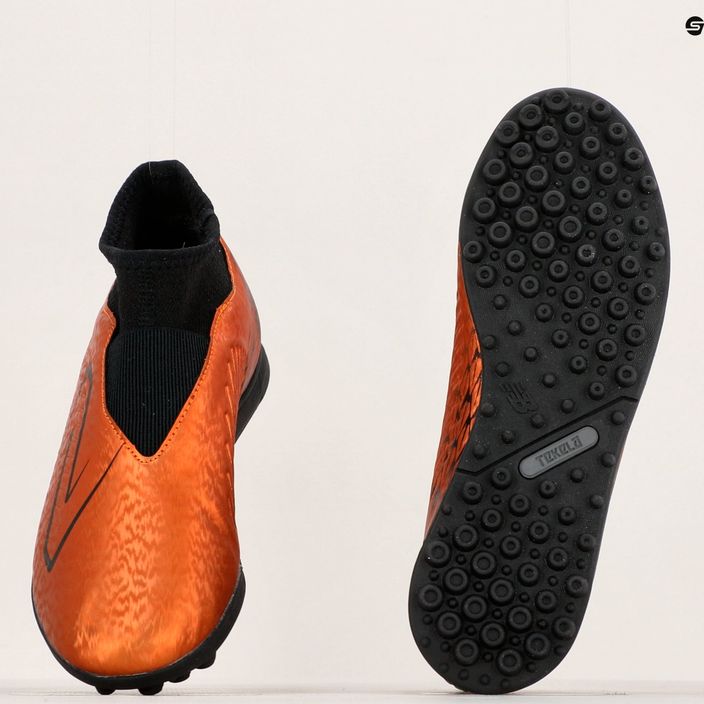Buty piłkarskie dziecięce New Balance Tekela V4 Magique JNR TF copper 12