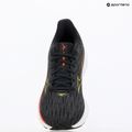 Buty do biegania damskie Mizuno Wave Rider 28 black/evening primrose/poppy red 9