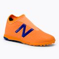 Buty piłkarskie dziecięce New Balance Tekela V3+ Magique JNR TF impulse/vibrant orange