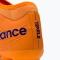 Buty piłkarskie dziecięce New Balance Tekela V3+ Magique JNR FG impulse/vibrant orange 8