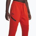 Spodnie treningowe męskie Under Armour Unstoppable Fleece Jgr surplus orange black 4