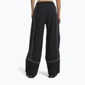 Spodnie damskie Under Armour Unstoppable Woven Wind ultimate black/anthracite/anthracite 3