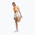 Spodenki do biegania damskie Under Armour Velociti Pro 4" 2N1 Shorts stone/reflective 2