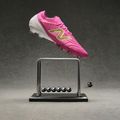 Buty piłkarskie New Balance Tekela Elite Low V5 FG pink heat/metallic gold/pink satin 8
