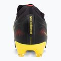 Buty piłkarskie New Balance Tekela Team Low V5 FG black 100/punch yellow/fire cracker 6