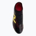 Buty piłkarskie dziecięce New Balance Tekela Team V5 black 100/punch yellow/fire cracker 5