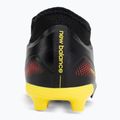 Buty piłkarskie dziecięce New Balance Tekela Team V5 black 100/punch yellow/fire cracker 6