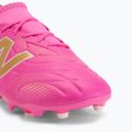 Buty piłkarskie dziecięce New Balance Tekela Team V5 pink heat/metallic gold/pink satin 7