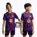 Koszulka piłkarska dziecięca Nike FC Barcelona Dri-Fit Pre-Match noble red/mineral yellow
