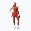 Spodenki do biegania damskie New Balance Run Essentials 3" Short neo flame 2