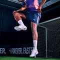 Buty piłkarskie PUMA King Ultimate FG/AG puma white/bluemazing/flat light grey/sunset glow 12