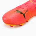 Buty piłkarskie dziecięce PUMA Future 7 Pro FG/AG Jr sunset glow/puma black/sun stream 7