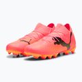 Buty piłkarskie dziecięce PUMA Future 7 Pro FG/AG Jr sunset glow/puma black/sun stream 10