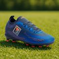 Buty piłkarskie dziecięce OneTeam Robero Teen FG/AG granatowy/pomarańczowy 21