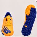 Buty piłkarskie dziecięce New Balance Furon V6+ Dispatch JNR TF impulse/vibrant orange 10