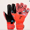 Rękawice bramkarskie Reusch Attrakt Gold X Evolution Cut Finger Support bright red/future blue/black 9