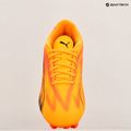 Buty piłkarskie PUMA Ultra Play FG/AG sunset glow/puma black/sun stream 9