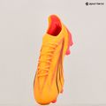 Buty piłkarskie PUMA Ultra Ultimate FG/AG sunset glow/puma black/sun stream 19