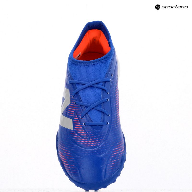 Buty do piłki nożnej dziecięce New Balance Tekela Team Low JR TF blue 9