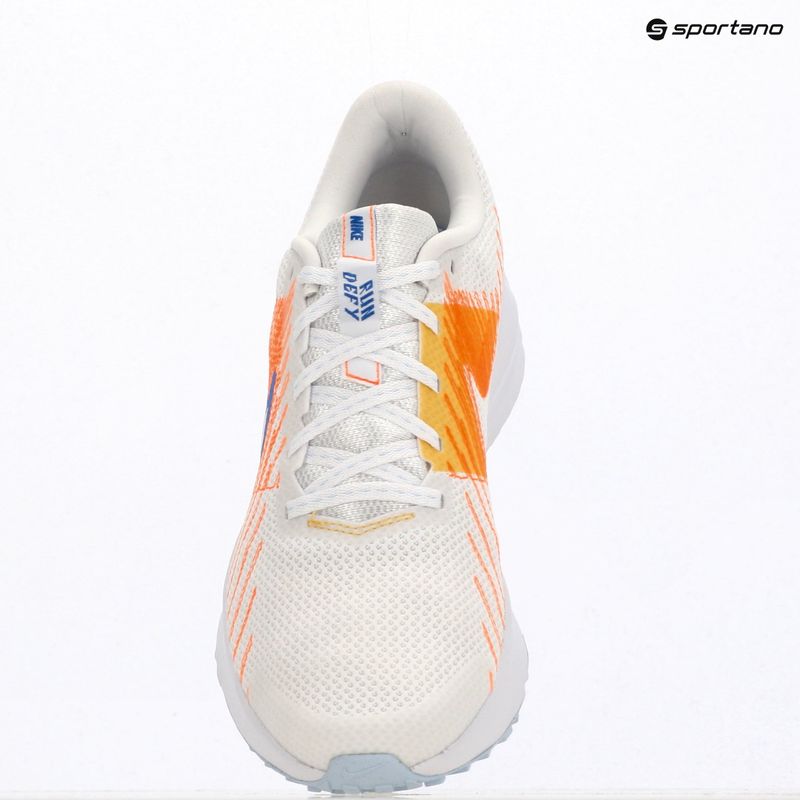 Buty do biegania męskie Nike Run Defy white/topaz gold/blue crystal 6