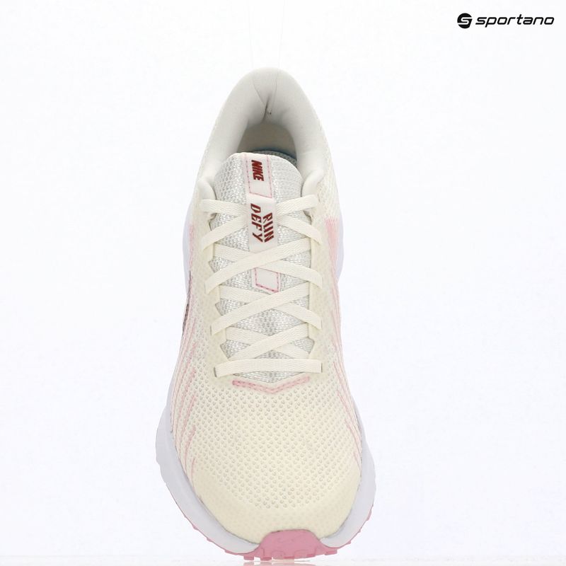 Buty do biegania damskie Nike Run Defy sail/white/pink rise/pink smoke 6