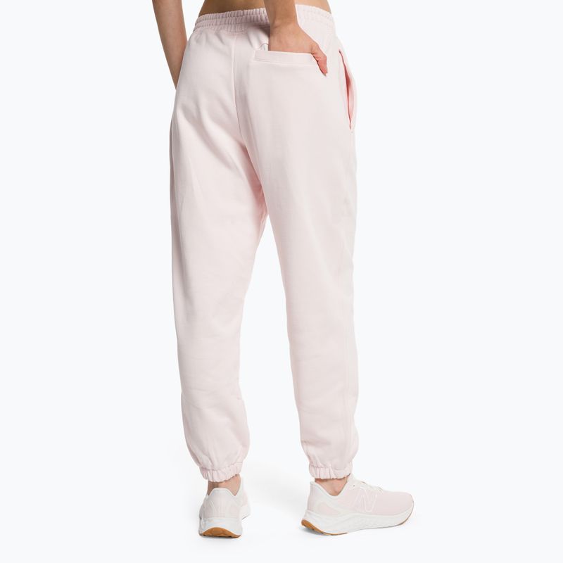 Spodnie damskie New Balance Athletics Nature State French Terry washed pink 3