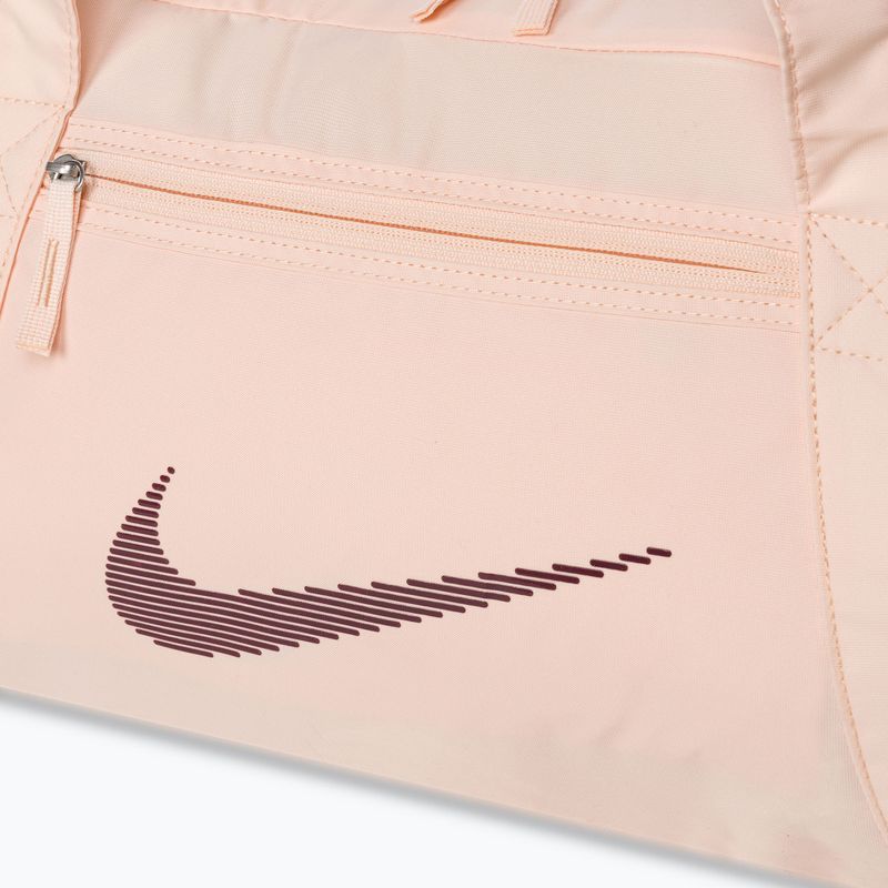 Torba treningowa damska Nike Gym Club 24 l guava ice/ guava ice/ night maroon 4