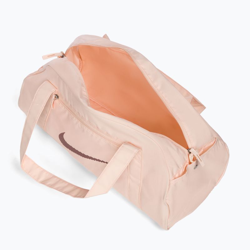 Torba treningowa damska Nike Gym Club 24 l guava ice/ guava ice/ night maroon 5
