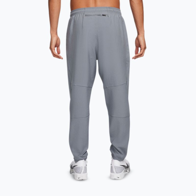 Spodnie męskie Nike Dri-Fit Challenger Woven smoke grey/black 3