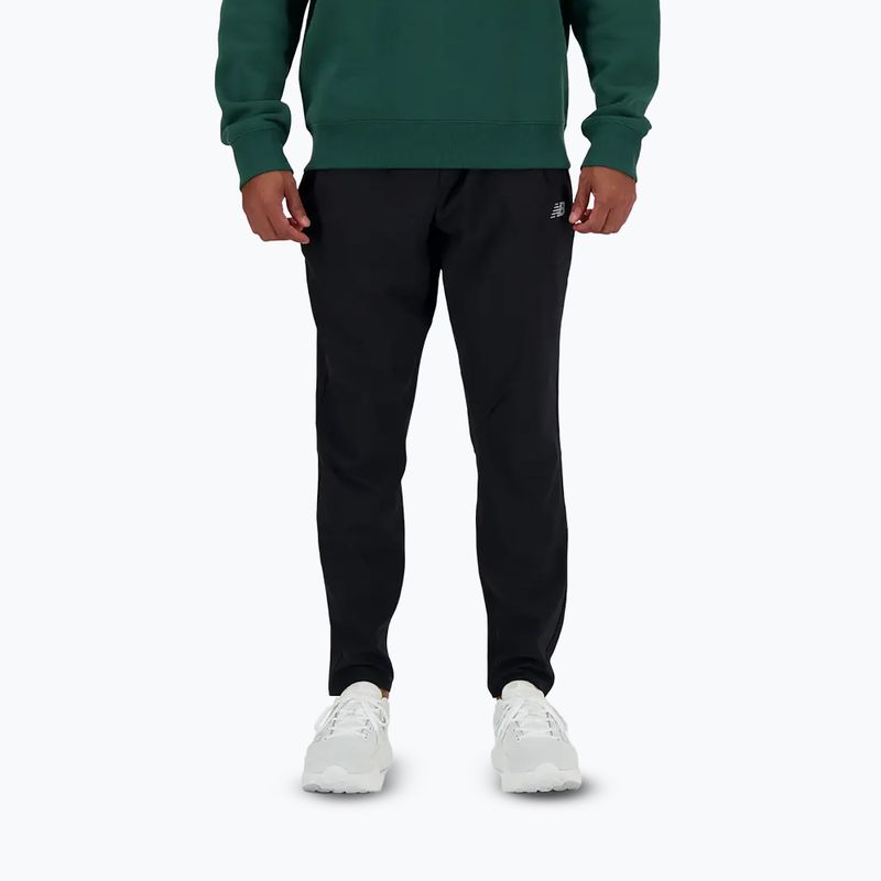 Spodnie męskie New Balance AC Tapered 29" black